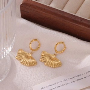 Elegant gold ginkgo leaf dangle earrings with detailed texture and hook design