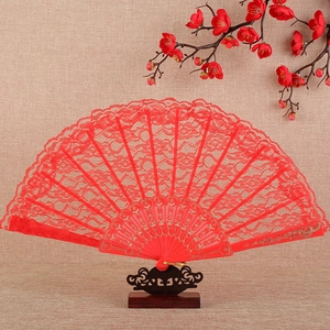 Elegant red lace folding fan with gold patterns and plum blossom decoration