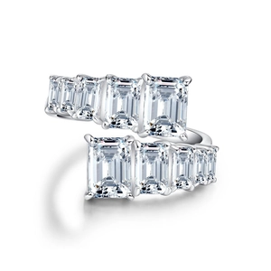 Minimalist 925 sterling silver open ring with emerald cut diamonds in wrap-around design