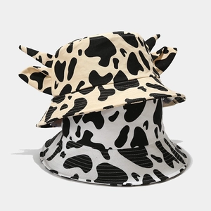Cartoon cow pattern bucket hat with 3D ears and horns in beige and white color