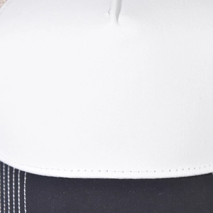 Detailed close-up of stitching on black and white cotton baseball cap visor edge