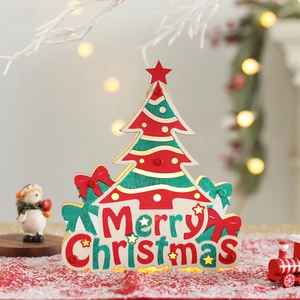 Lighted wooden Christmas tree ornament with Merry Christmas text and red star topper
