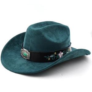 Detail of dark teal western fedora featuring ethnic floral embroidery and gemstone buckle