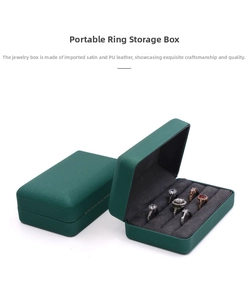 Deep green PU leather jewelry box with velvet ring slots and textured exterior detail