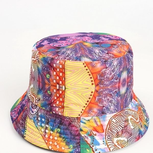 Detailed close-up of vibrant tie-dye bucket hat showing stitching and fabric texture