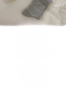Detail showing high-quality cotton fabric and tight knit stripes on grey crew socks