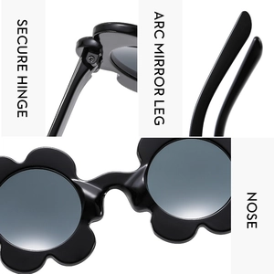Detail view of flower-shaped sunglasses featuring secure hinges and arc mirror legs