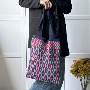 Large knit tote bag with navy blue and red geometric checkered pattern for women