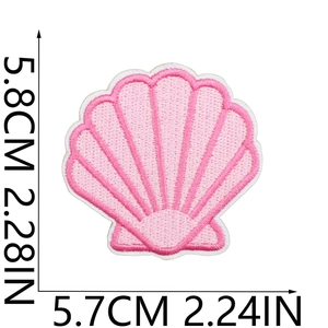 Detailed size view of pink seashell embroidery patch with white edge and dimensions