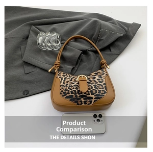 Size comparison of leopard print shoulder bag with brown leather trim and a phone