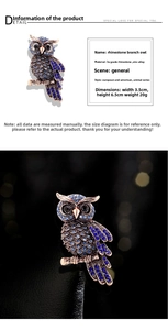 Macro shot of owl brooch featuring blue crystals and rose gold zinc alloy branch