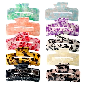 Variety set of 10 colorful hair clips with marble patterns and floral prints on white base