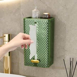 Luxury green diamond pattern wall-mounted tissue box with gold accents on marble wall