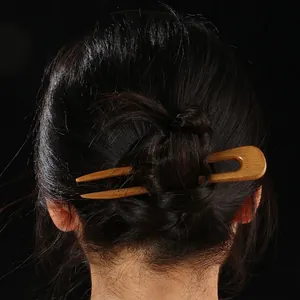 Épingle à cheveux en bois en forme de U pour chignons au design élégant et minimaliste