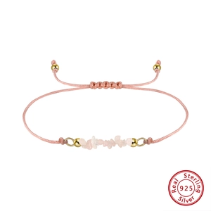 Detail of pink natural stone beaded bracelet with 925 silver and adjustable cord