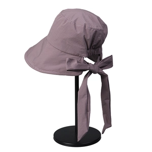 Women wide brim sun hat with ribbon bow and ponytail hole in dusty pink fabric