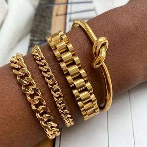 Set of 4 gold-plated stainless steel bracelets featuring Cuban chains and watch band style