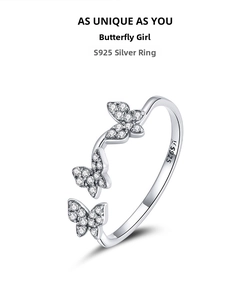 Macro shot of S925 sterling silver ring showing butterfly details and fine zircon stones