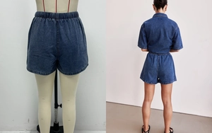 Detail view showing elastic waistband and stitching on blue denim shorts for women