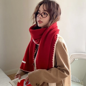 Winter red knitted scarf with white contrast stitching and est mode woven label