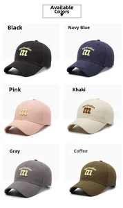Detail view of cotton baseball caps in six colors with 3D letter embroidery