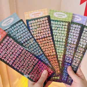 Macro shot of colorful glitter alphabet stickers for scrapbook and idol card decoration