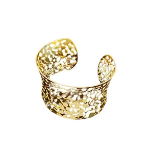 Irregular hollow open cuff bracelet in gold finish with minimalist aesthetic for women