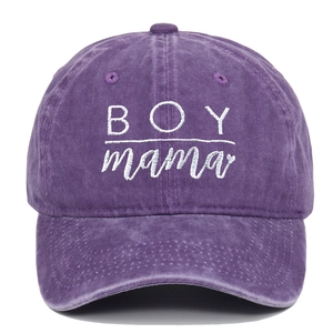 Detail shot of the Boy Mama embroidery on the washed purple cotton baseball cap surface
