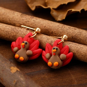 Turkey shaped handmade clay stud earrings with autumn leaves for Thanksgiving decor