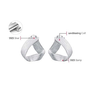 Macro view of S925 sterling silver triangle earrings with sandblasting craft and stamp