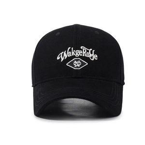 Classic black cotton baseball cap featuring white WakgeRoye embroidery and curved brim