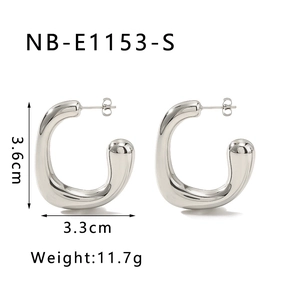 Detail view of silver C-shaped earrings with dimension specs 3.6cm by 3.3cm