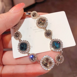 Sparkling crystal square and round link bracelet with gold plating and colorful gemstones