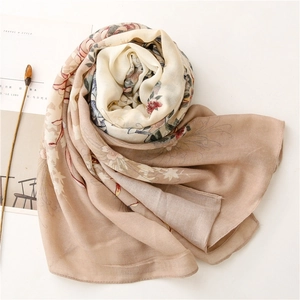 Vintage floral linen-feel shawl with rose print in khaki and red on white background