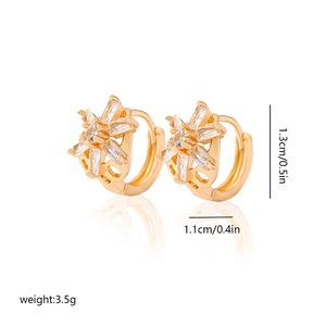 Detail view of gold flower earrings with square cubic zirconia and size measurements