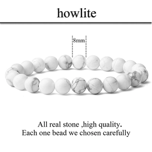 Detail view of 8mm white howlite natural stone beads on a high-quality elastic bracelet