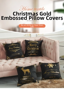 Detail of black velvet Christmas pillow cases with gold reindeer and snowflake foil prints