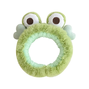 Cute green plush frog eye headband with heart detail for face washing and makeup