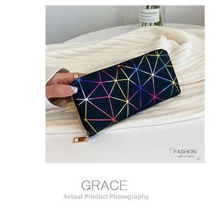 Close-up of long zip wallet with colorful geometric pattern and gold zipper detail