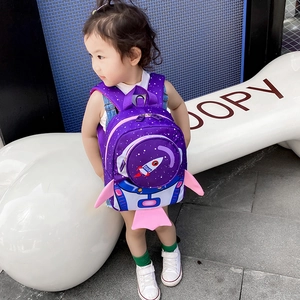 Detail of purple rocket backpack with astronaut window and safety leash for toddlers