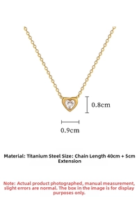 Detail of titanium steel heart pendant with clear zircon and dimensions display