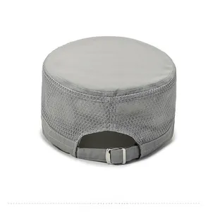 Macro detail of breathable mesh fabric and adjustable silver metal buckle on gray cadet cap