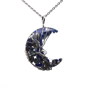 Handmade silver wire tree of life crescent moon pendant with natural blue crushed stones