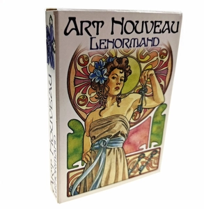 Macro side view of Art Nouveau Lenormand oracle card box featuring elegant illustrations