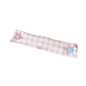 Pink checkered cable organizer tie with red bow print and heart shaped button