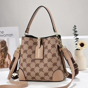 Retro monogram bucket bag with khaki leather trim and stylish printed wide strap