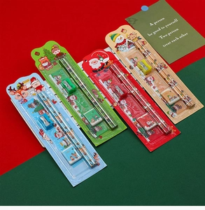 Detailed view of Christmas stationery sets with pencils, rulers, erasers and sharpeners