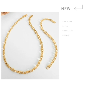 Detail shot of the gold plated chunky chain necklace with interlocking lock links