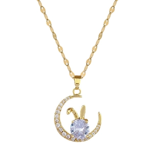 Golden moon and rabbit necklace with sparkling crystals on a sleek titanium steel chain