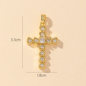 Detail view of a gold-plated zircon cross pendant with dimensions of 3.3cm by 1.8cm